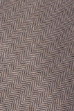 Tone-on-tone fishbone patterned silk and wool tie in sand color